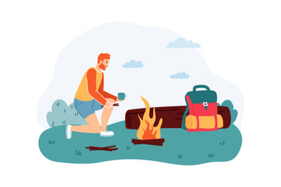 Man sitting near campfire and drinking cup of tea near log. Male touri