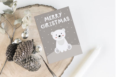 Cute christmas card with little polar bear and lettering