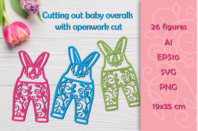 Cutting out baby overalls.