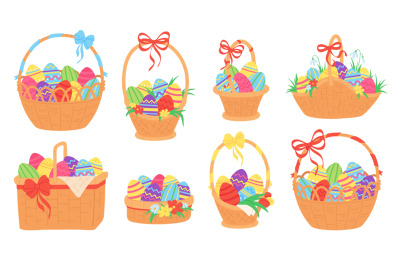 Easter baskets. Painted chocolate eggs in wicker basket with ribbon, g