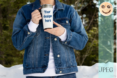 Travel mug mockup of a woman in denim jacket.