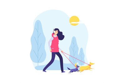 Walking dog. Woman on nature, pet owner. Two cute dogs and girl in par