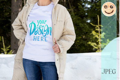 White sweatshirt mockup of a girl in beige quilted  jacket, model mock