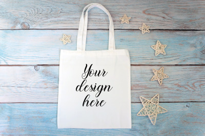 White tote bag mockup on a wooden background. Rustic Farmhouse.