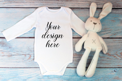 Bodysuit Mockup with long sleeves on a wooden background.