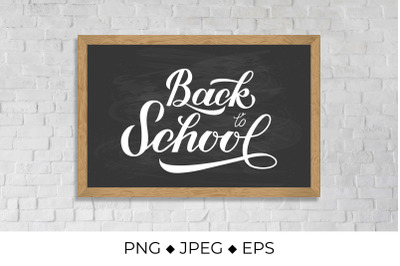 Back to school calligraphy hand lettering on chalkboard