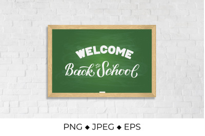 Welcome Back to school hand lettering on green board with wooden frame