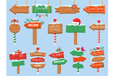 North pole signs. Christmas wooden street signboad with snow. Arrow si