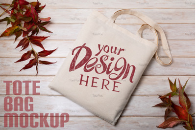 Rustic tote bag mockup with red wild grass.