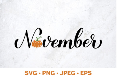 November. Fall calligraphy lettering with pumpkin