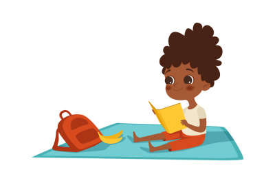 Girl reading. Afroamerican child with book and backpack sits on plaid.