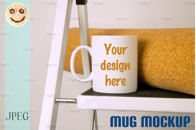 White coffee mug mockup with stepladder.