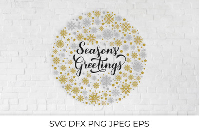 Seasons Greetings calligraphy hand lettering with gold and silver snow