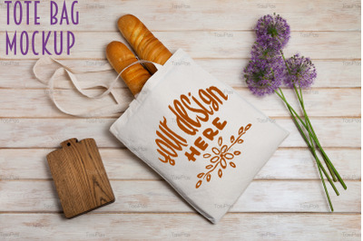 Tote bag mockup with french baguette.