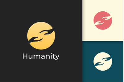 Solidarity or Humanity Logo in Simple Circle With Two Hand