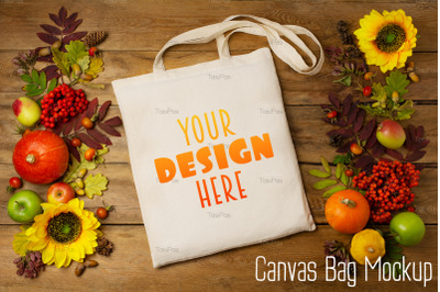 Rustic tote bag mockup with sunflowers and rowanberry. Canvas tote bag