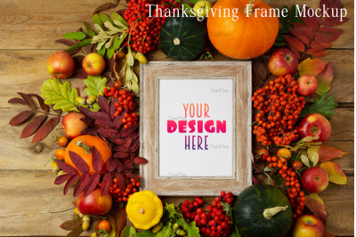 Wooden small frame mockup with pumpkins and fall leaves.