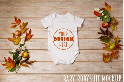 White baby short sleeve bodysuit mockup with snowberry and fall leaves