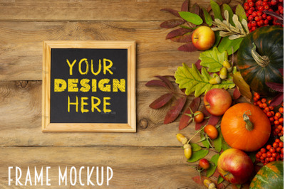 Square wooden picture frame mockup with rosehip and fall leaves