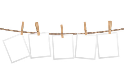 Realistic photo frames. Frame hanging on wooden clothespins on rope. M