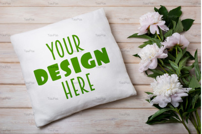 Pillow mockup with pale pink peony.