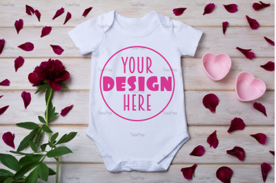 White baby short sleeve bodysuit mockup with pink hearts two pink hear