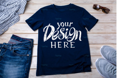 Unisex navy blue T-shirt mockup with trainers and jeans.