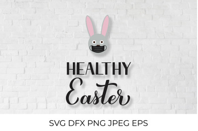 Healthy Easter calligraphy hand lettering with masked bunny