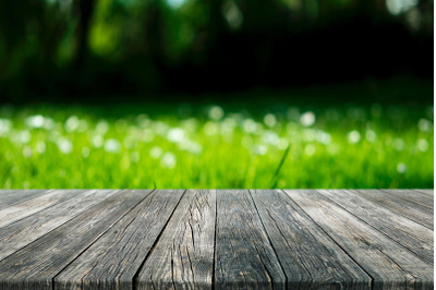 Empty Table Rustic Black Wooden Plank With Garden Bokeh Background