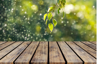 Empty Wooden Deck Table Old Rustic Plank With Leaves Bokeh Background