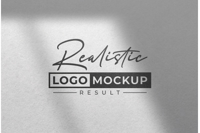 Debossed Black Logo Mockup on White Paper with Overlay Shadow