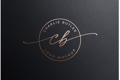 Debossed Feminine Rose Gold Foil Logo Mockup on Black Paper