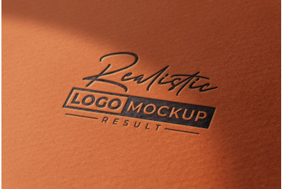 Letterpress Paper Black Logo Mockup on Red Paper