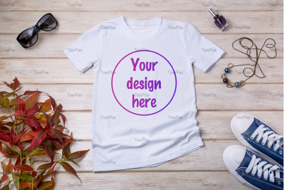 Women white T-shirt mockup with blue sneakers.