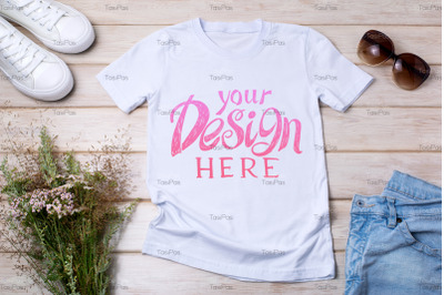 Women white T-shirt mockup with wild grass and flowers.