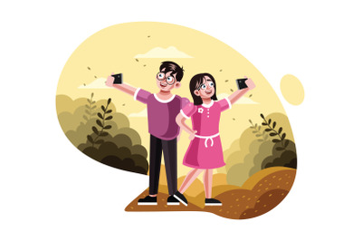 Brother and sister taking selfie picture