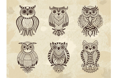 Decorative owls. Tribal decoration of wild birds with beauty wings eth