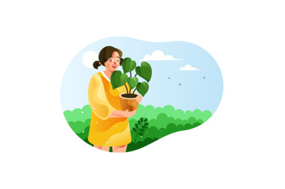 Girl carrying a pot of green plants