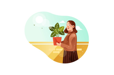 Girls holding potted plants during the day