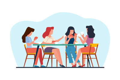 Happy women friends sit around table and play cards on weekend. Girls