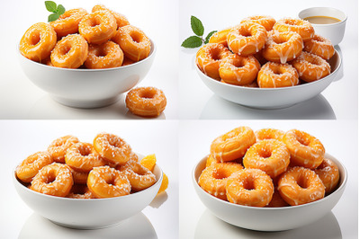 Tasty donuts in white bowl, isolated in white background