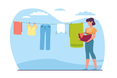 Woman housewife hangs washed laundry on clothesline. Clothing hanging