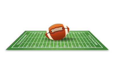 American football ball on grass