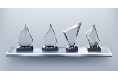 Glass awards on display shelf. Gallery of honor, clear transparent cry