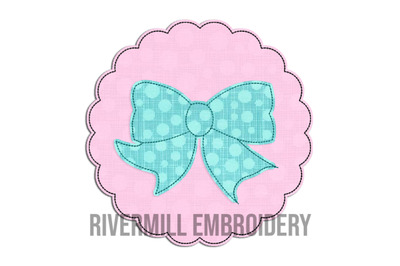 Raggy Applique Bow In A Scalloped Circle Machine Embroidery Design