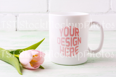 White coffee mug mockup with  pink tulip 