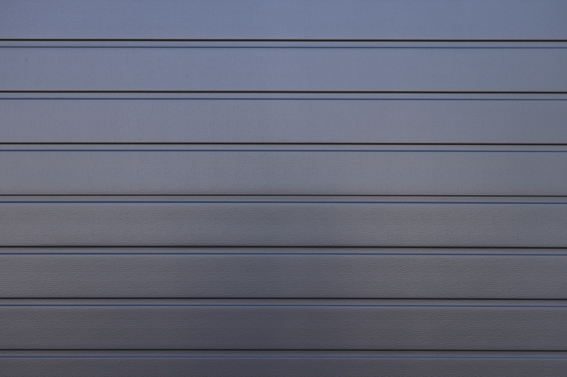 dark-gray-painted-corrugated-steel-fence-texture-wall