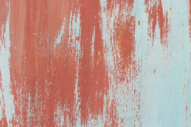 weathered-red-on-blue-rusty-painted-wall-texture-brush-strokes