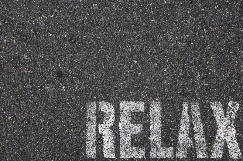 road-asphalt-texture-bitumen-surface-structure-with-painted-relax-word