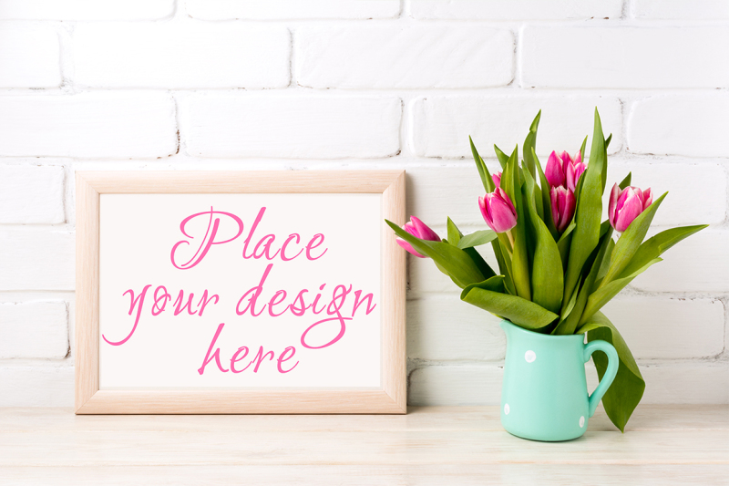 wooden-landscape-frame-mockup-with-bright-pink-tulips-bouquet